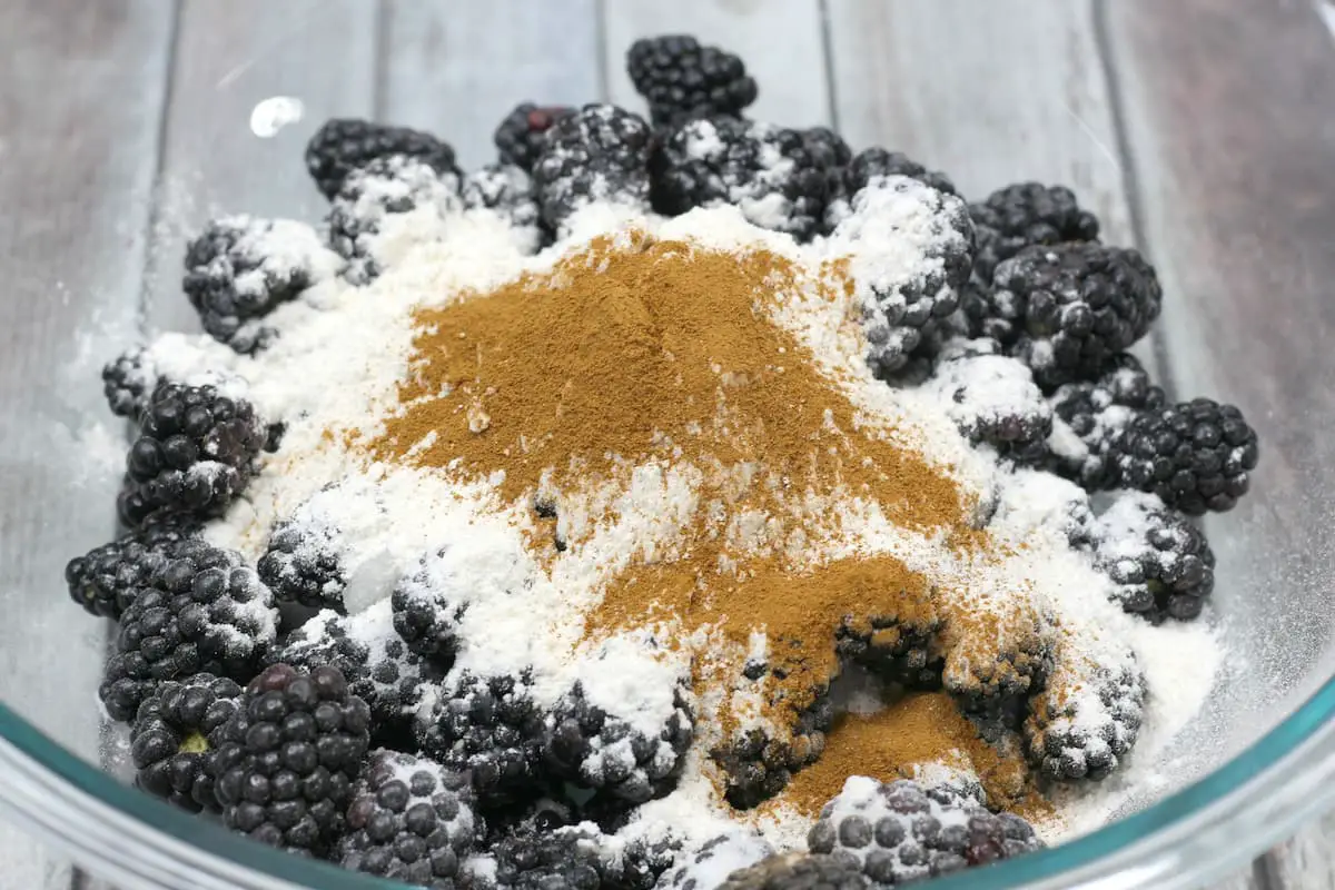 image of blackberry pie ingredients being mixed