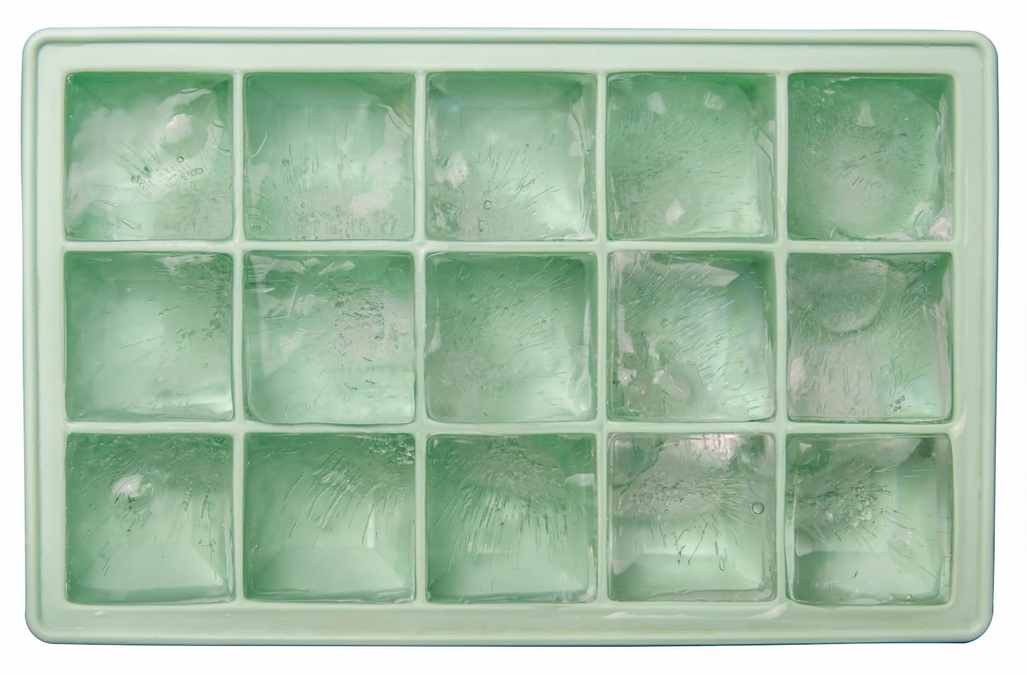 An image of an isolated ice tray containing ice cubes.